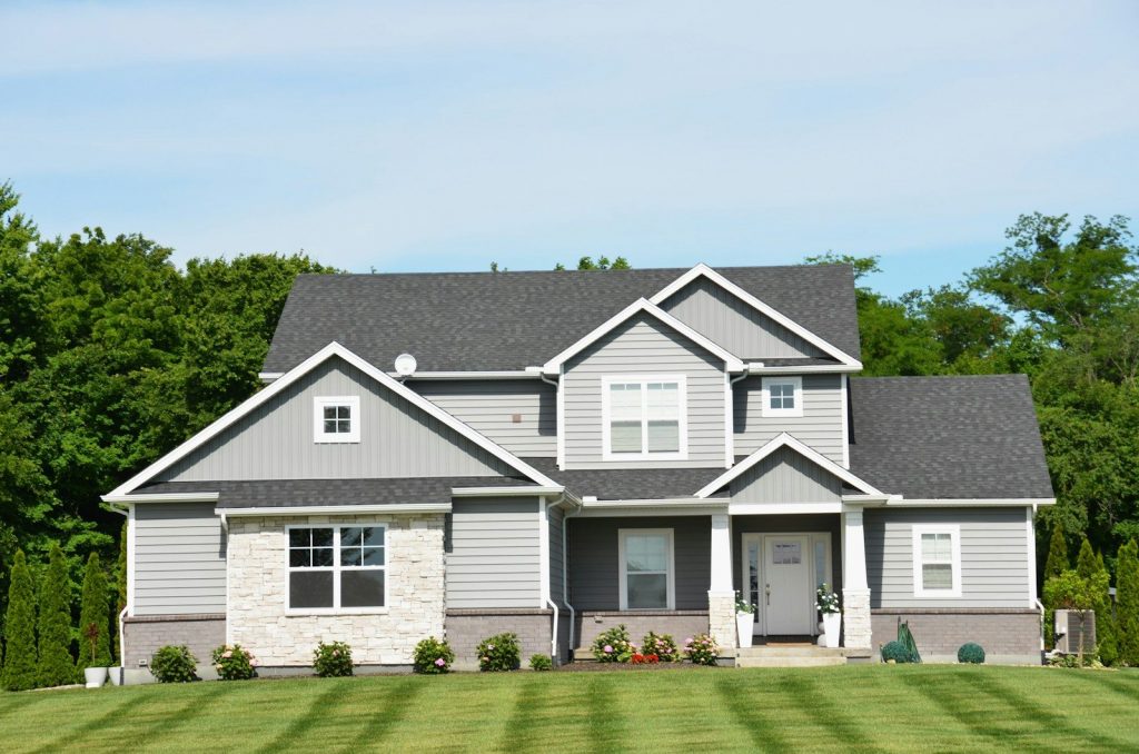 Two-story American suburban home with front lawn