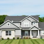 Two-story American suburban home with front lawn