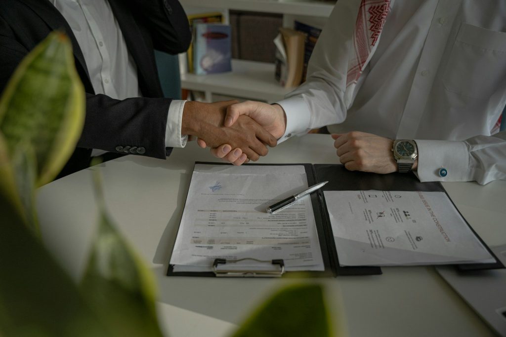 A handshake over a contract, what borrowers want from private capital