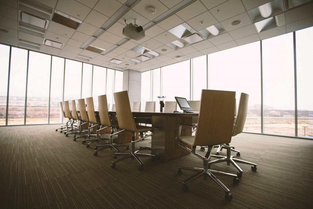 An executive boardroom, where a lender defines its credit box