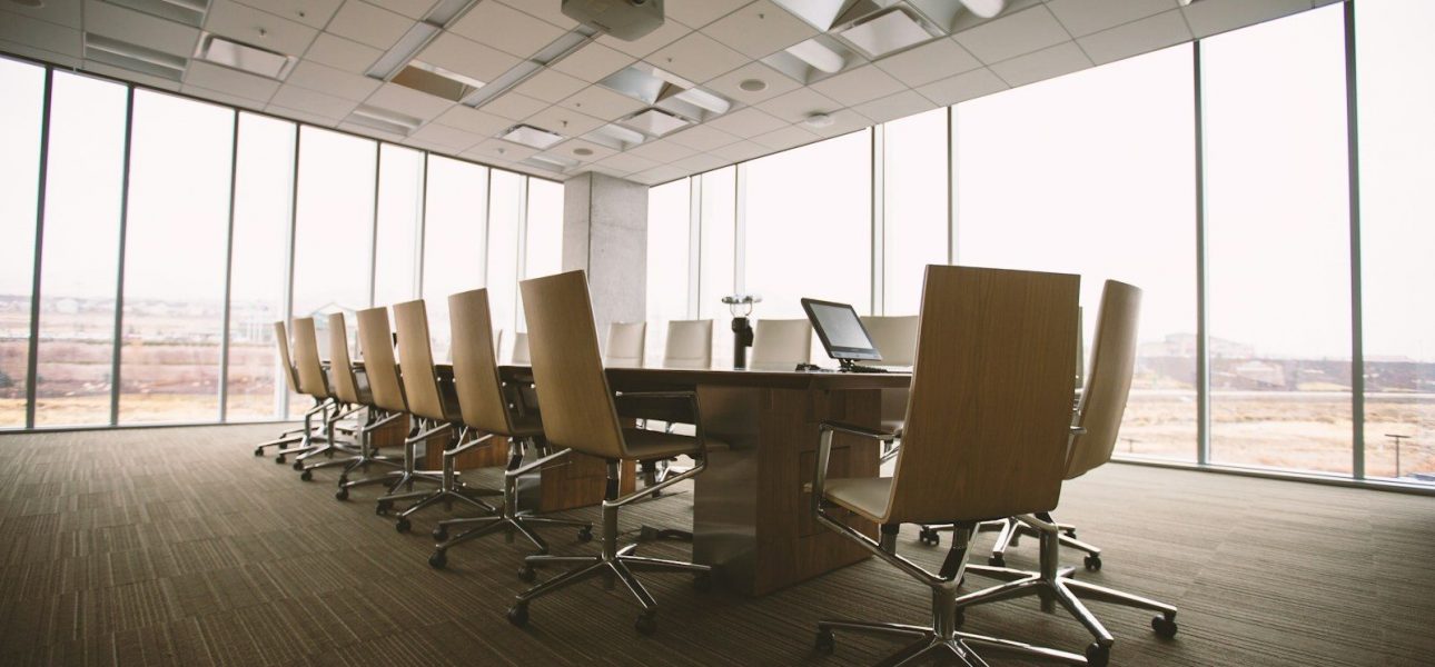 An executive boardroom, where a lender defines its credit box