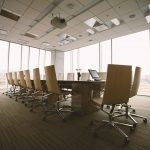 An executive boardroom, where a lender defines its credit box