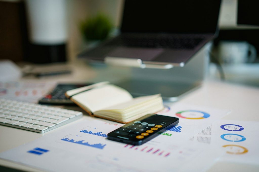 Financial charts and a calculator, evaluating boutique private credit opportunities