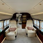 A private jet cabin, family office capital reaching private credit without building a platform