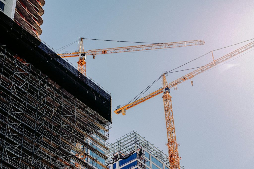 Tower cranes over a high-rise construction site