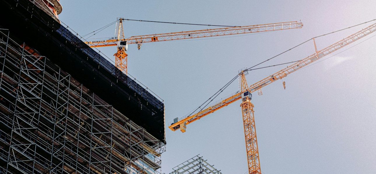 Tower cranes over a high-rise construction site