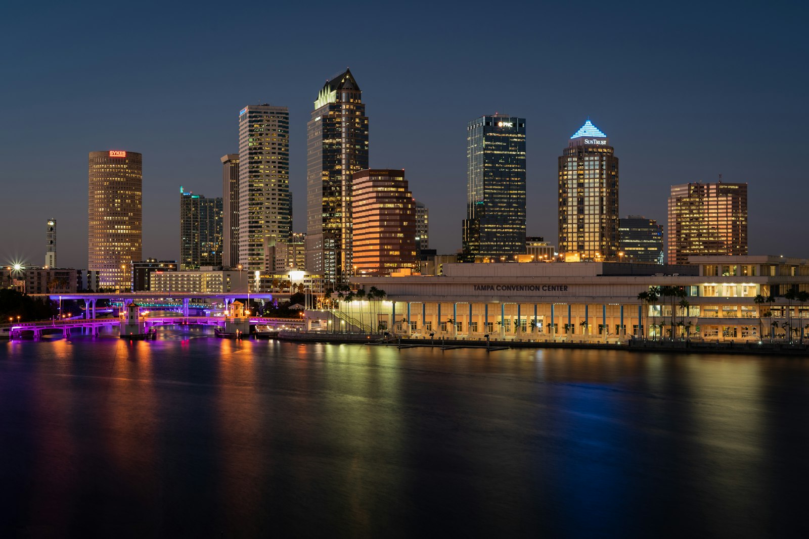 The downtown Tampa, Florida skyline lit up along the Hillsborough River waterfront