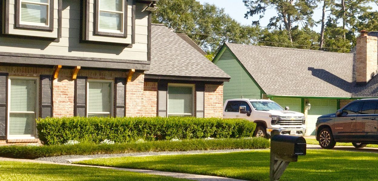 Accidental landlord Houston: two-story single-family home on a sunny suburban Houston street