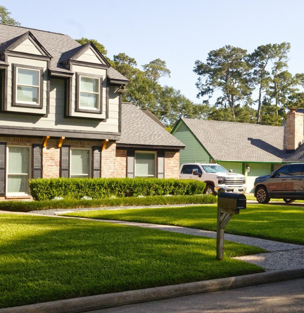 Accidental landlord Houston: two-story single-family home on a sunny suburban Houston street