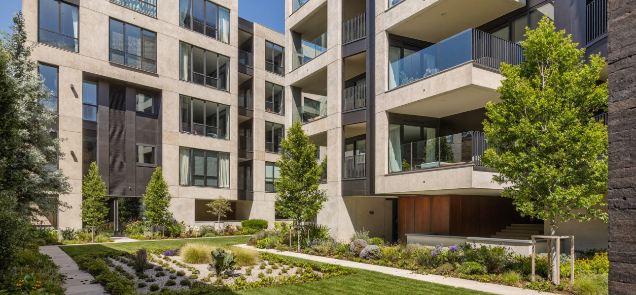 Modern garden-style apartment community with landscaped courtyard and pool in Atlanta, Georgia